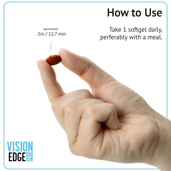 Hand holding Vision Edge PRO softgel with dosage instructions for daily use